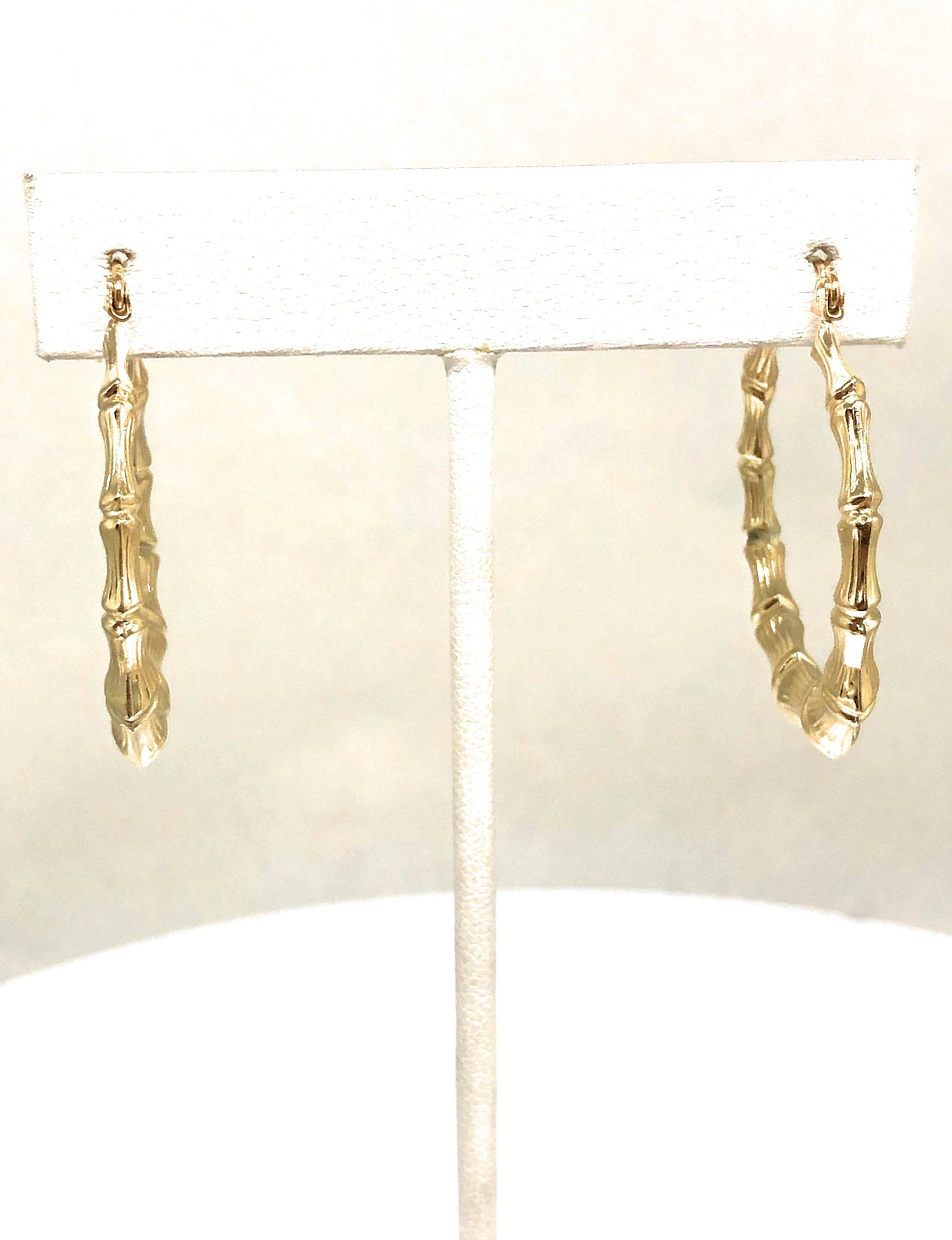 thumbnail interactive-video image 1 of 10K Solid Yellow Gold Bamboo Hoop Earrings – 18mm To 78mm – Snap Closure – Nickel-Free 1 of 5